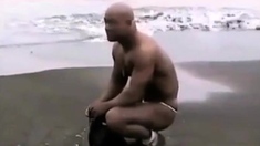 Asian Bodybuilder Barely Covered At The Beach