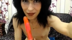 skinny mature babe strips and fucks her dildo